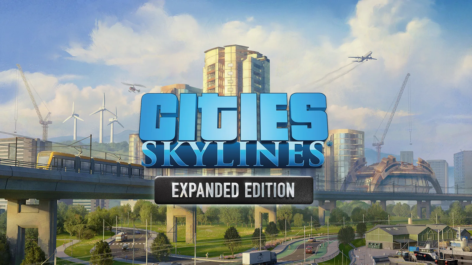 לוגו Cities: Skylines Expanded Edition מעל עיר עם מגדלים, מסילת רכבת מוגבהת, מנופים וטורבינות רוח.